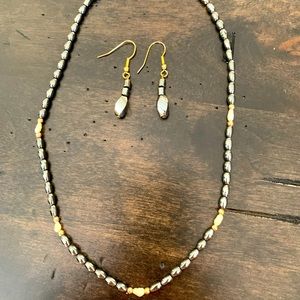 Hanging earrings and necklace.